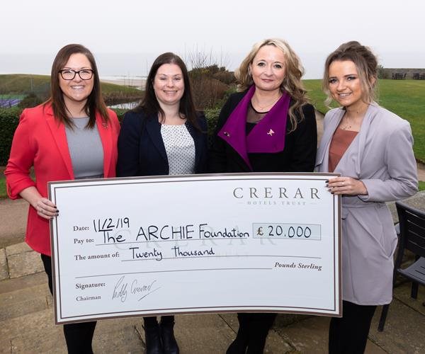 Archies Cheque With Carolyn Carrington At Golf View