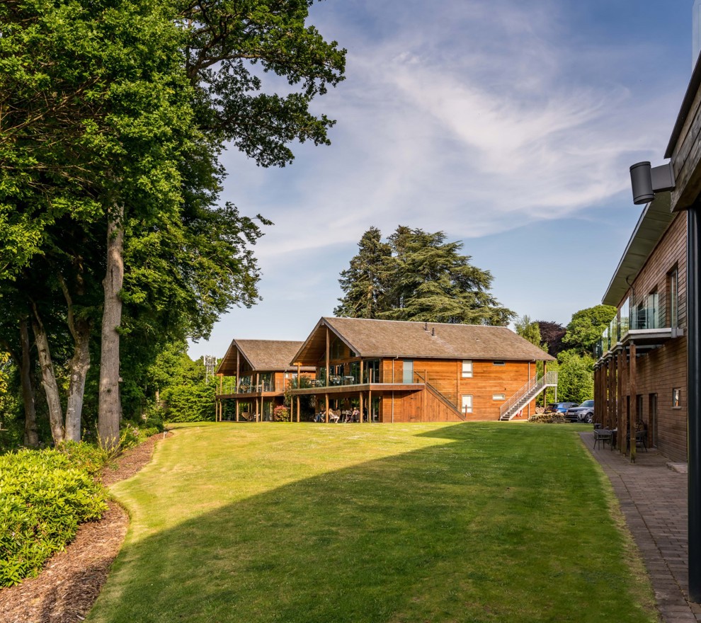 Fonab Castle | Green Garden & Turk with Luxury Lodge Accommodation with Wooden Exterior in Pitlochry ?? Fonab Castle