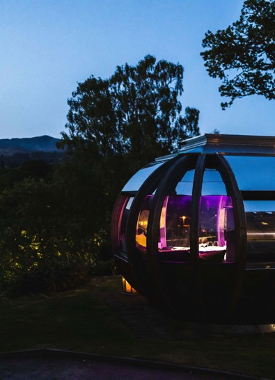 Dining pod at dusk with Scottish loch and mountains backdrop in Pitlochry  ?? ''