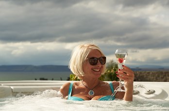 Lady With Prosecco in Spa Hot Tub on Wellness Break in Scotland