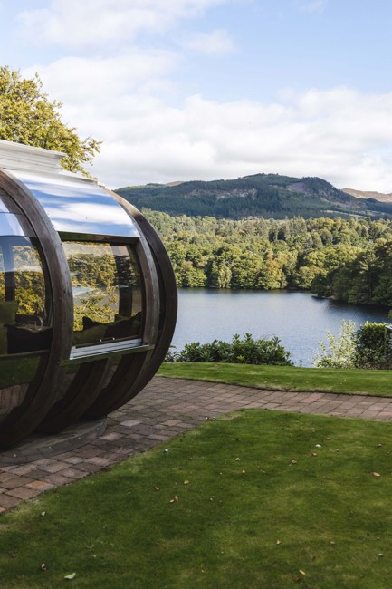 Fonab Castle | View of loch and pine trees from a dining pod at Fonab Castle Luxury Hotel Scotland ?? Fonab Castle